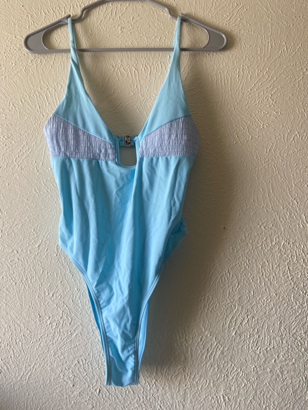 Light Blue One-Piece Swimsuit with Front Accents